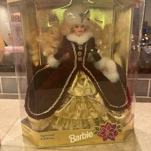 Collector Holiday Barbies-4 of them in box never opened